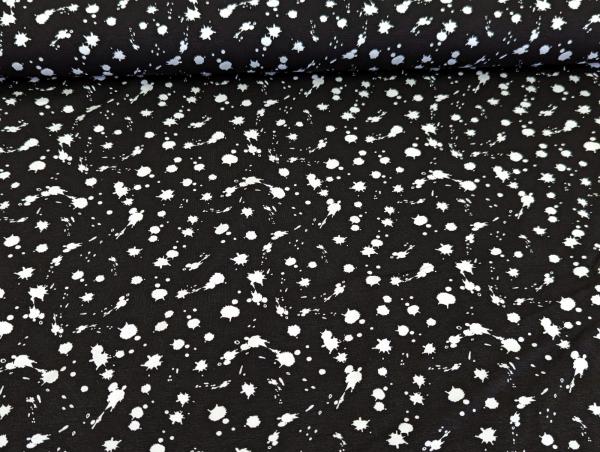Baumwolljersey Weiße Farbkleckse auf Schwarz 35 x 150 cm